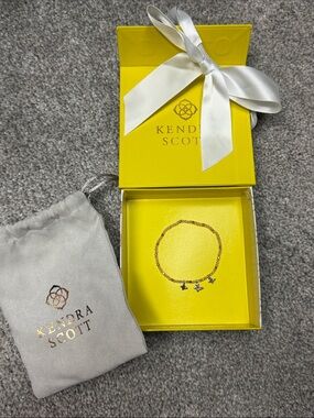 Kendra Scott Gold Beaded Bracelet with Star & Cross Charms